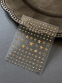 Macro shot of gold star nail art stickers with 3D metallic texture and hollow star designs - Gold (YT6835Me)