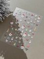 Vista ravvicinata di adesivi 3D per unghie con motivi natalizi in rilievo e Babbo Natale - Stile Gelatina (YT6707Gd)