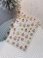 3D embossed Christmas nail stickers featuring gingerbread houses and snowmen on model YT6705 - Christmas House Snowman Shell Luster (YT6705Te)