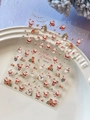 Detailed macro view of 3D embossed Santa Claus nail stickers with festive patterns - Embossed Santa Claus (YT6572)