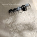 Detail view of 3D white bow nail stickers on French style patterned false nails - White Bowknot(YT3632Pm)
