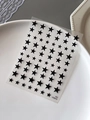 Minimalist black star nail art stickers YT5913 on a white ceramic plate for nail decor - YT5913Pm / Black