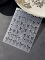 3D relief nail sticker featuring black bows and white pearl lines, model YT5596 - Embossed Bowknot (YT5596)