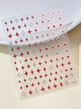Detailed view of gold and red heart-shaped star nail stickers on a textured background - Red Heart Silver Edge Star (YT5806Si)