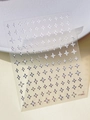 Detail shot of silver metallic star nail art stickers on a textured leather background - Iridescent Silver Star (YT5805Si)