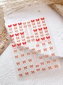 Elegant red bow nail art stickers with gold edges and lace details on stone background - Embossed Bronzing Red Gold Edge (YT5473Pro)