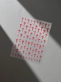 Self-adhesive red cross nail art stickers set YT5708 on minimalist grey leather background - Red Embossed Cross (YT5708)