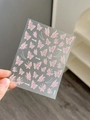 Close-up of YT4490 nail art stickers featuring pink butterfly and pearl designs - Relief Butterfly (YT4490)