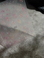 Holographic laser nail stickers with sparkling firework patterns on a transparent backer - Laser YT4489xgpro