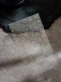 Detailed view of laser gold firework nail stickers YT4256 on a vintage background - Gold Stamping (YT4256me)