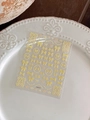 Detailed macro view of yellow 3D bow nail art stickers with textured grid patterns - Bright Yellow Bow Polka Dot Style (YT4777)