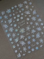 Macro detail of laser iridescent snowflake nail stickers with holographic ice crystal motifs - Holographic Ice Crystal Snowflake Style (YT4659)