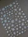 Macro shot of YT4660 holographic snowflake nail stickers with laser glitter effect - White Holographic Snowflake Decal (YT4660)
