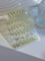 Detailed view of green butterfly nail art stickers with gold foil lines and delicate patterns - Light Green Butterfly (YT4899)