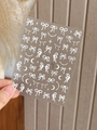 Detail of white embossed bow and star nail art stickers with pearl chain designs - Embossed Jelly YT4793gd / White Embossed Style (YT4793gd)