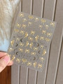 Close-up of embossed gold bow nail art stickers with moon and star patterns - Embossed Jelly YT4794me / Gold Embossed Style (YT4794me)