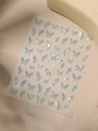 Macro shot of 3D iridescent butterfly nail stickers with metallic laser effect, model YT4558 - Holographic Blue Purple Butterfly Style (YT4558te)