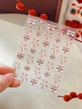 Macro detail of YT4888 nail art stickers featuring traditional Chinese lion dance and fireworks - Embossed Gold Stamping Style (YT4888)