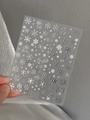 Macro detail of silver metallic snowflake nail art stickers with embossed texture YT4678 - Silver Stamping Snowflake Style (YT4678si)