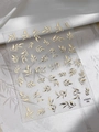 Detail of 3D gold embossed nail art stickers with elegant leaf and branch patterns - Gold Leaves (YT5075Me)