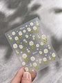 Detail of floral nail art stickers with small daisy patterns and green leaves - Flat Printed Style (YT5182Pm)