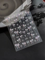Detailed view of 3D embossed bow and star nail art stickers with glitter finish - 3D Embossed Gradient Bowknot Style (YT4883)
