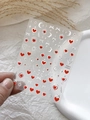Sparkly star and red heart nail stickers with metallic silver accents on model hand - Silver Stamping Jelly YT4953GdPro