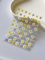Detailed view of colorful sunflower smiley face nail stickers with 3D adhesive backing - Flat (YT3992)
