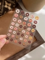 Macro shot of 3D donut embossed nail art stickers YT4131 with various dessert patterns - Embossed Style (YT4131)