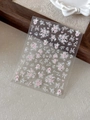 Close-up of 5D embossed nail stickers featuring pink flowers and white bows, model YT4104 - Embossed (YT4104)