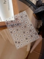 Detail of YT4155 nail decals featuring black and white 5-petal flower relief patterns - Embossed YT4155