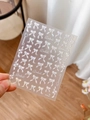 Detailed view of holographic rainbow bowknot nail stickers with self-adhesive backing - Holographic Silver (YT4127Te)