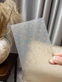 Dettaglio di adesivi per unghie con luna e sole dorati e testo Magic metallizzato - Oro (YT3806me)