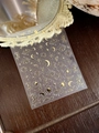 Close-up of gold star and moon nail stickers with mystical sun and eye patterns - Gold Stamping Star Moon Style (YT3804me) / Gold