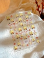 Dettaglio degli adesivi per unghie Maneki-Neko con lamina d'oro e gatti della fortuna - Stile Gatto della Fortuna Bronzato (YT4492mepro)