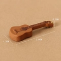 Miniature resin brown guitar ornament with detailed size measurements 3.6x1.2cm - Guitar
