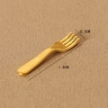 Miniature golden dollhouse dinner fork with embossed handle, size 1.8cm by 0.3cm - Fork / Gold