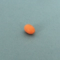 Miniature dollhouse food accessory featuring one tiny orange resin egg on a blue background - Red Egg