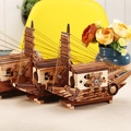 Three-piece set of antique wooden sailing boat models with charred finish and anchor details - 269 Smooth Sailing Style