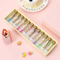 Set van 12 mini wensflesjes met gekleurd zand en houten LOVE labels in een geschenkverpakking - Spreek nu