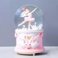 Detailed relief of pink roses and white swans on the resin base of a musical crystal ball - Automatic Snowfall + Music + Light / Ballerina Girl Pink