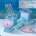 Creative boat-shaped liquid hourglass pen holder with floating cartoon characters - Cartoon Cruise Ship Pen Holder