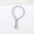 Minimalist light blue braided rope bracelet with adjustable gold metal slide closure - Haze Blue