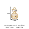 Detailed view of a gold lantern charm made of copper with white shell inlay and zircons - Cable Car Style (H-13632)