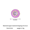 Macro detail of an 8.2mm gold plated copper bead with purple oil drip and zircon inlay - Round Style (H-13483) / Purple