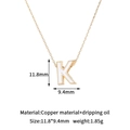 Detail of 14K gold plated letter K pendant with white oil dripping and measurements - K-Single Pendant