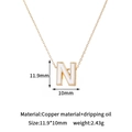 Detail of 14K gold plated letter N pendant with white enamel dripping oil inlay - N-Single Pendant