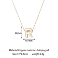 Close-up of 14K gold plated letter R pendant with dimensions 12mm by 9.7mm - R-Single Pendant