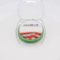 Detail view of USA Magicline green crystal elastic string in transparent packaging - Green (0.8mm)