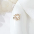 Macro view of gold plated geometric double ring connector with marquise zirconia - Circular Leaf Shape (H-9981)